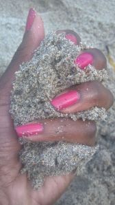 sand in hand